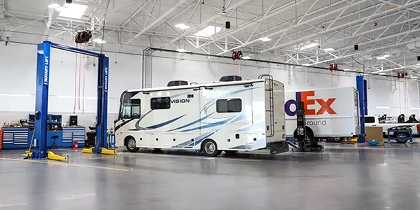 Vehicles in service bays
